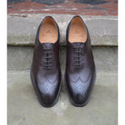 A Berwick 1707 moka brown wholecut Oxford brogue shoes with a goodyear welted leather sole, last week, and a smooth finish.