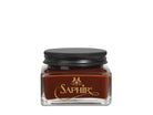 A glass jar with a black lid labeled 'SAPHIR' containing cream shoe polish.