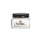 A glass jar with a black lid labeled 'SAPHIR' containing cream shoe polish.