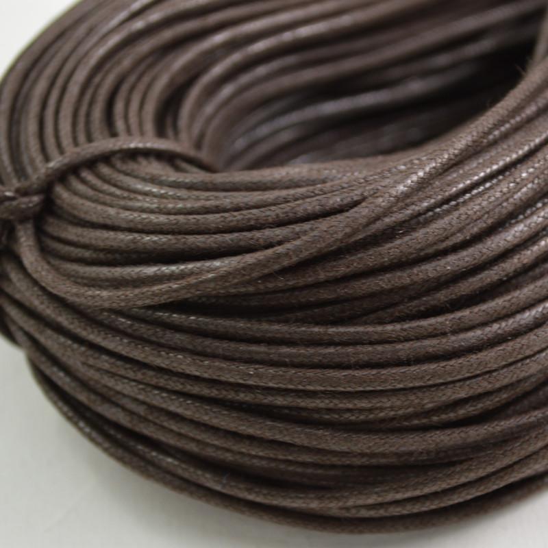 brown coloured waxed round casual shoe laces, tied in individual bundles.