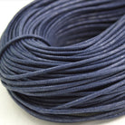 blue coloured waxed round casual shoe laces, tied in individual bundles.