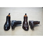 A Berwick 1707 black leather Chelsea boot with a side elastic panel and a low heel, displayed on a white background.