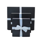 AFPOS gift boxes with white ribbon tired with a central bow