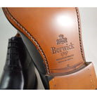 Elegant black chisel toe oxford shoe made of box calf leather with a goodyear welted single leather sole.