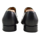 Elegant black chisel toe oxford shoe made of box calf leather with a goodyear welted single leather sole.