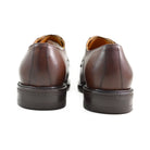 A pair of dark brown Berwick 1707 Split Toe Derby shoes with laces, set against a white background.