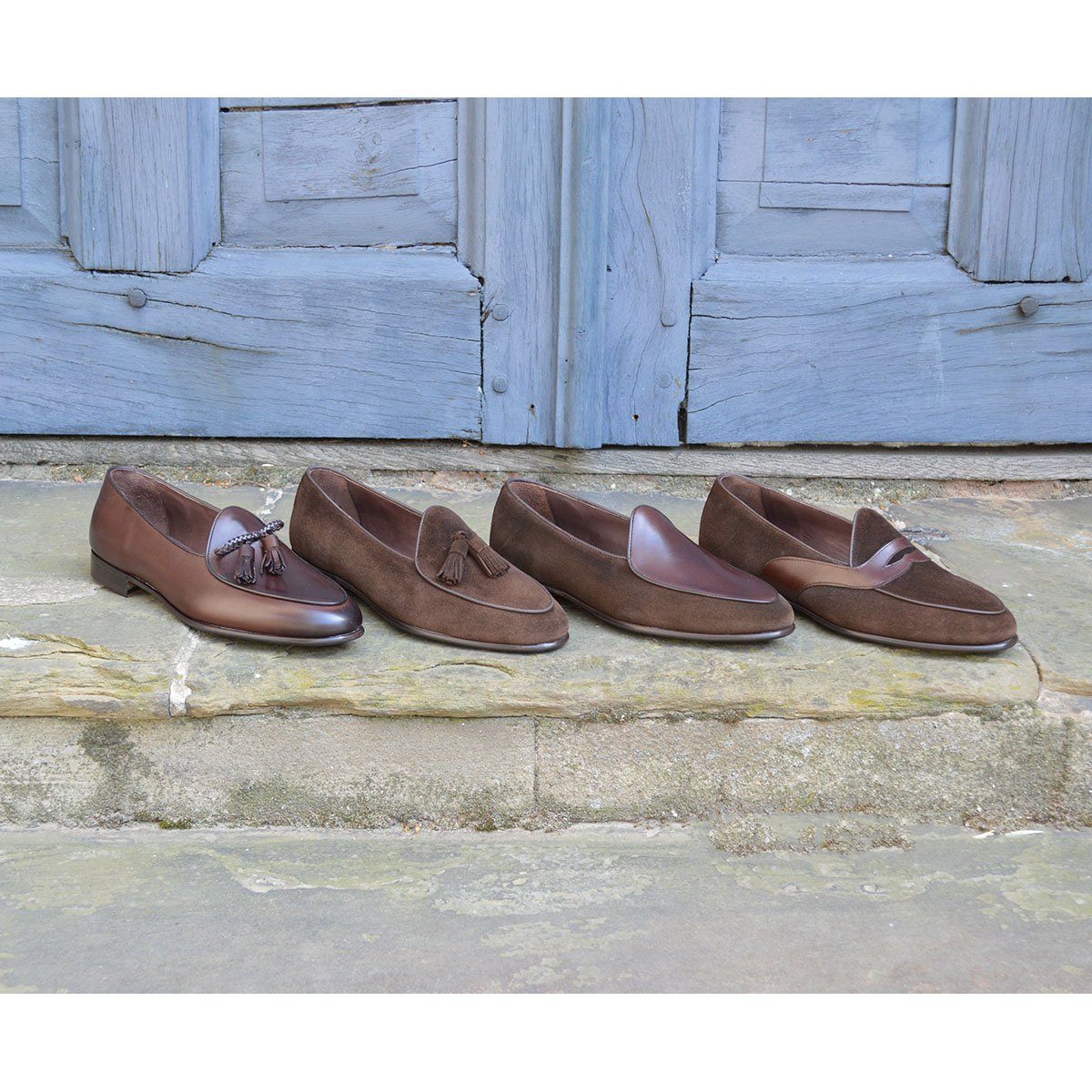 A Berwick 1 707 dark brown leather Belgian loafer with a braided leather bow tie and tassel adornment.