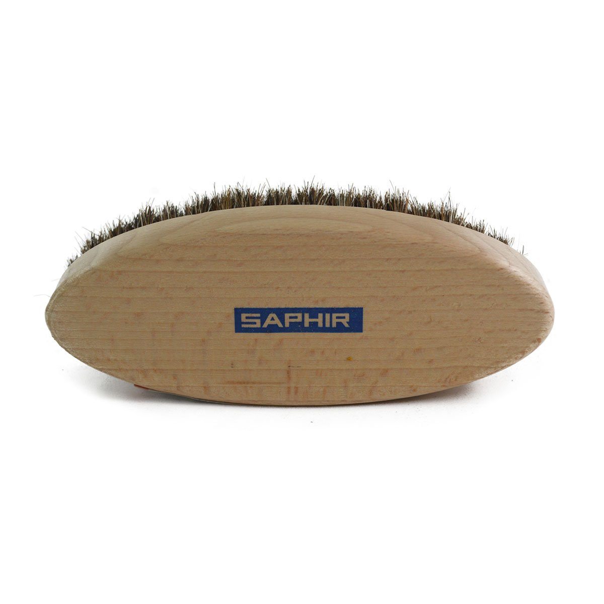An oval shoe shine brush with horsehair bristles, with natural brown bristles, wooden handle, on a white background.