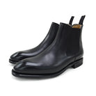 A Berwick 1707 black leather Chelsea boot with a side elastic panel and a low heel, displayed on a white background.