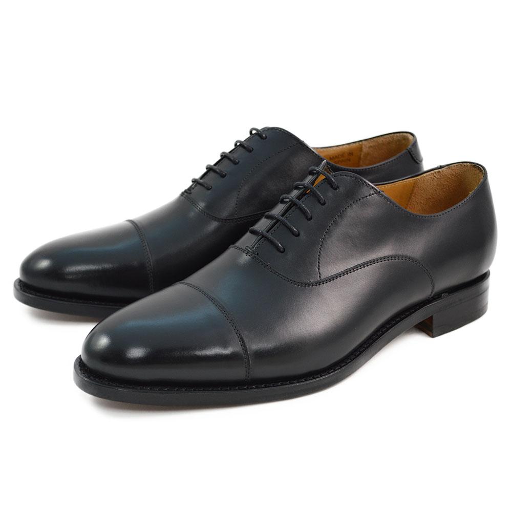 A Berwick 1707 black leather toe cap oxford shoe with a goodyear welted construction and single leather sole.