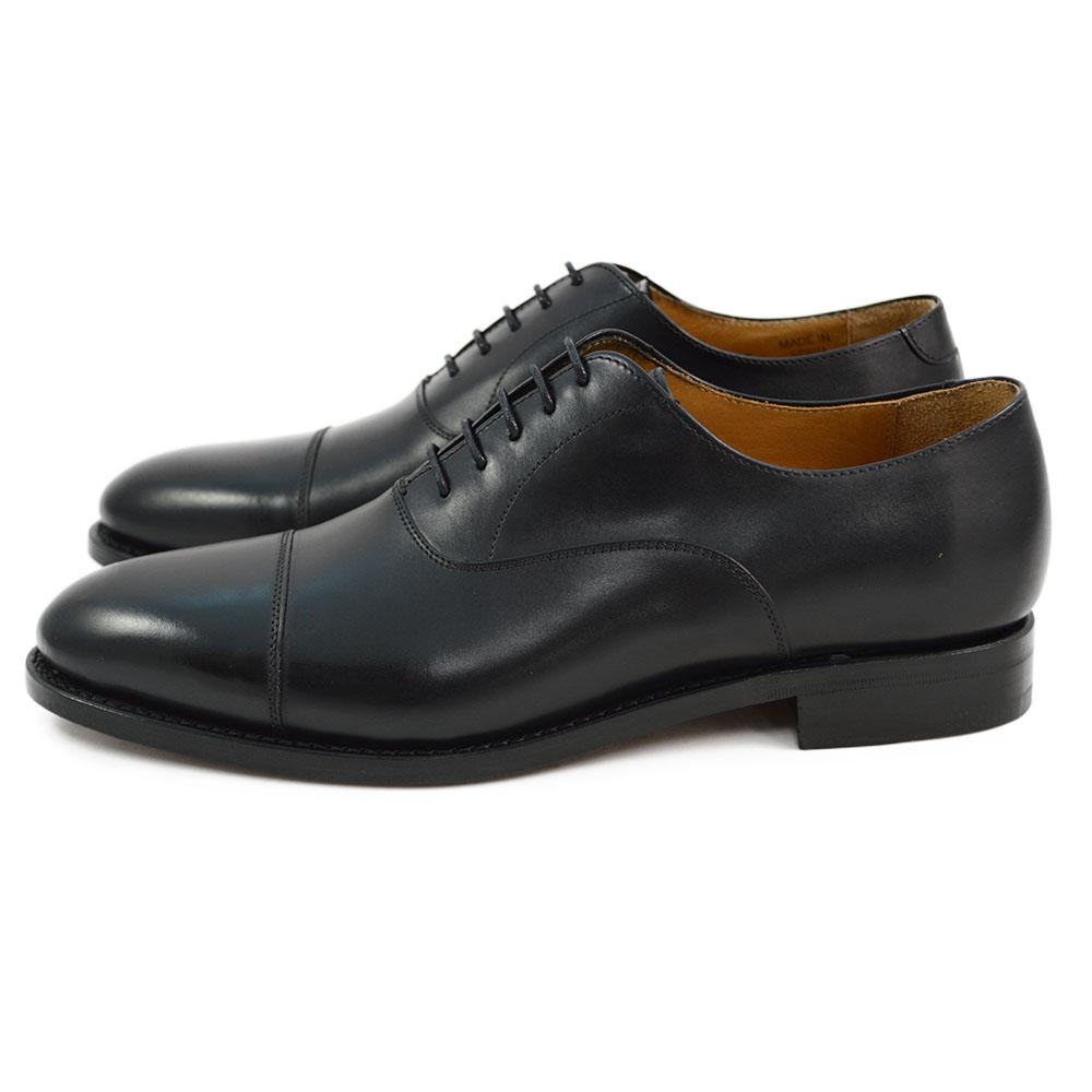 A Berwick 1707 black leather toe cap oxford shoe with a goodyear welted construction and single leather sole.
