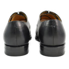 A Berwick 1707 black leather toe cap oxford shoe with a goodyear welted construction and single leather sole.