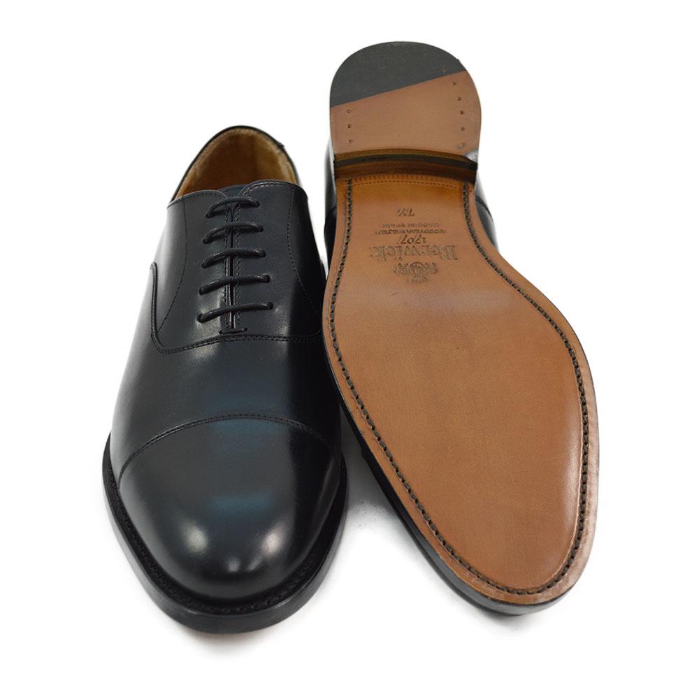 A Berwick 1707 black leather toe cap oxford shoe with a goodyear welted construction and single leather sole.