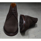 A Berwick 1707 dark brown suede Chukka boot with a round toe and low heel.