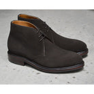 A Berwick 1707 dark brown suede Chukka boot with a round toe and low heel.