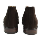 A Berwick 1707 dark brown suede Chukka boot with a round toe and low heel.