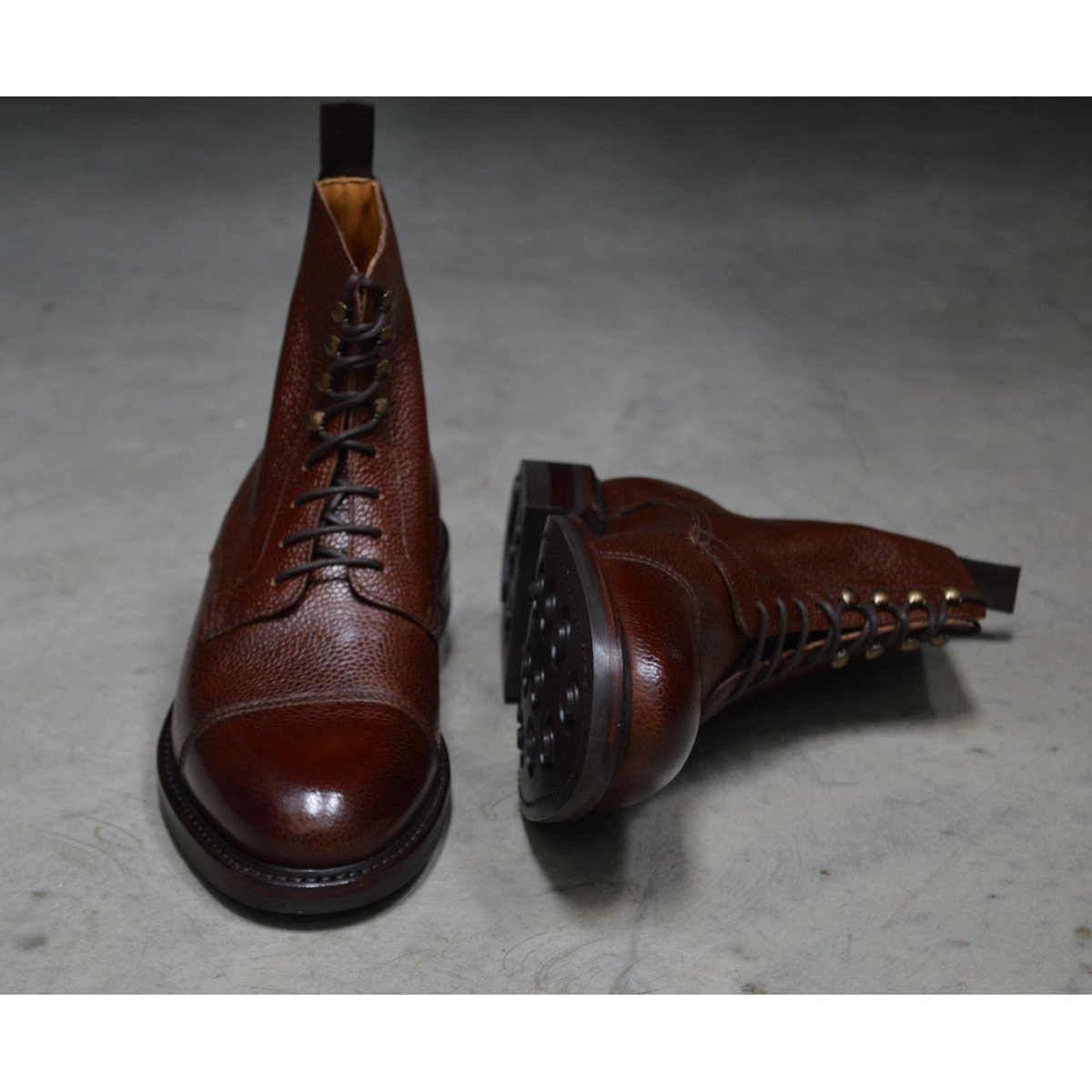 A Berwick 1707 dark brown, premium grain leather lace-up boot with a cap toe and a low heel & Dainite Sole