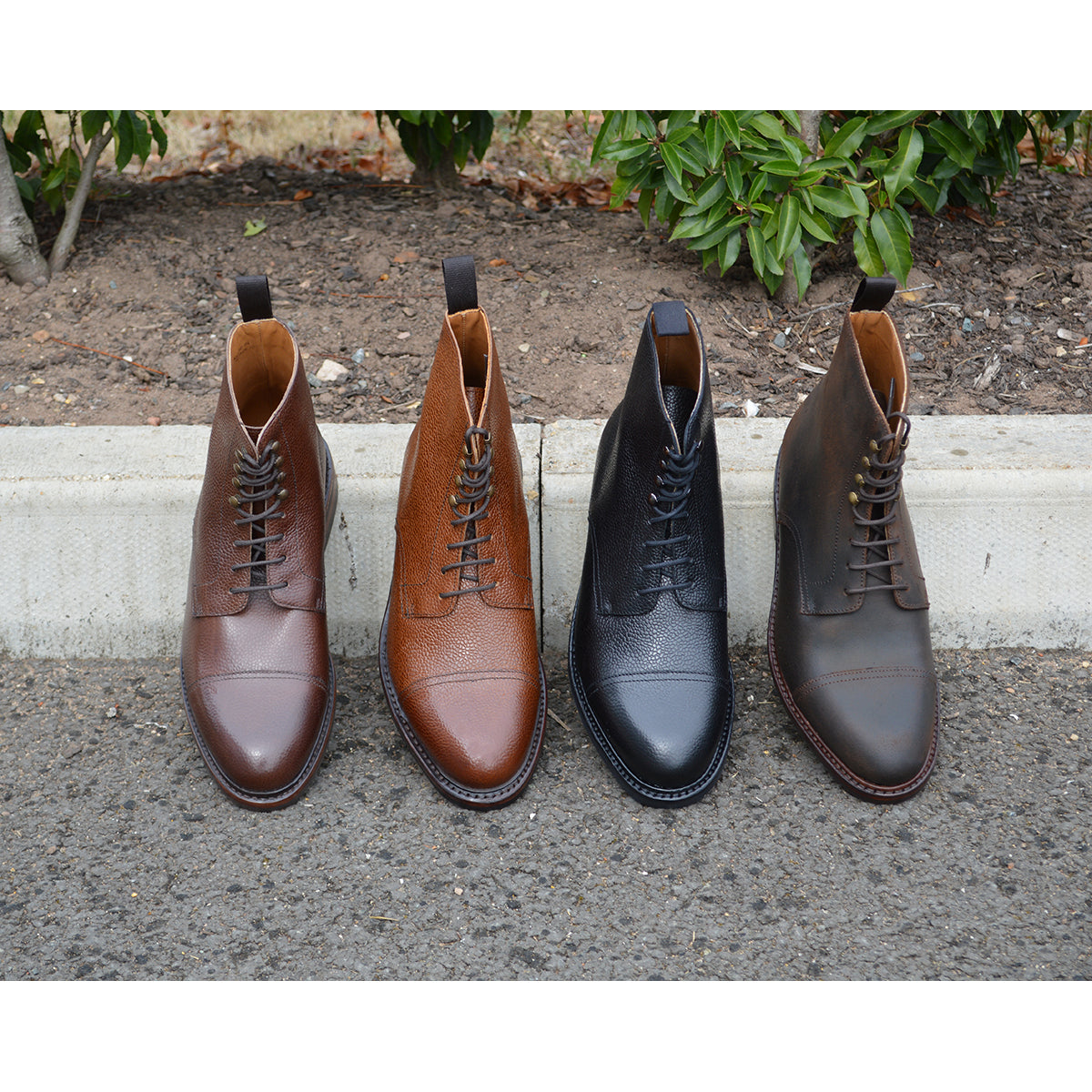 A range of Berwick 1707 premium grain leather lace-up boots with a cap toe and a low heel & Dainite Sole