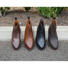 A range of Berwick 1707 premium grain leather lace-up boots with a cap toe and a low heel & Dainite Sole