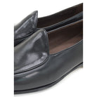 A classic black Berwick 1707 Belgian loafer with a smooth deerskin leather upper, an almond toe shape, and a low heel.