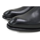 A Berwick 1707 black leather Chelsea boot with a side elastic panel and a low heel, displayed on a white background.