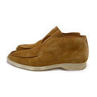 A brown ankle boot made of reverse kudu suede, featuring a low heel and a smooth texture.