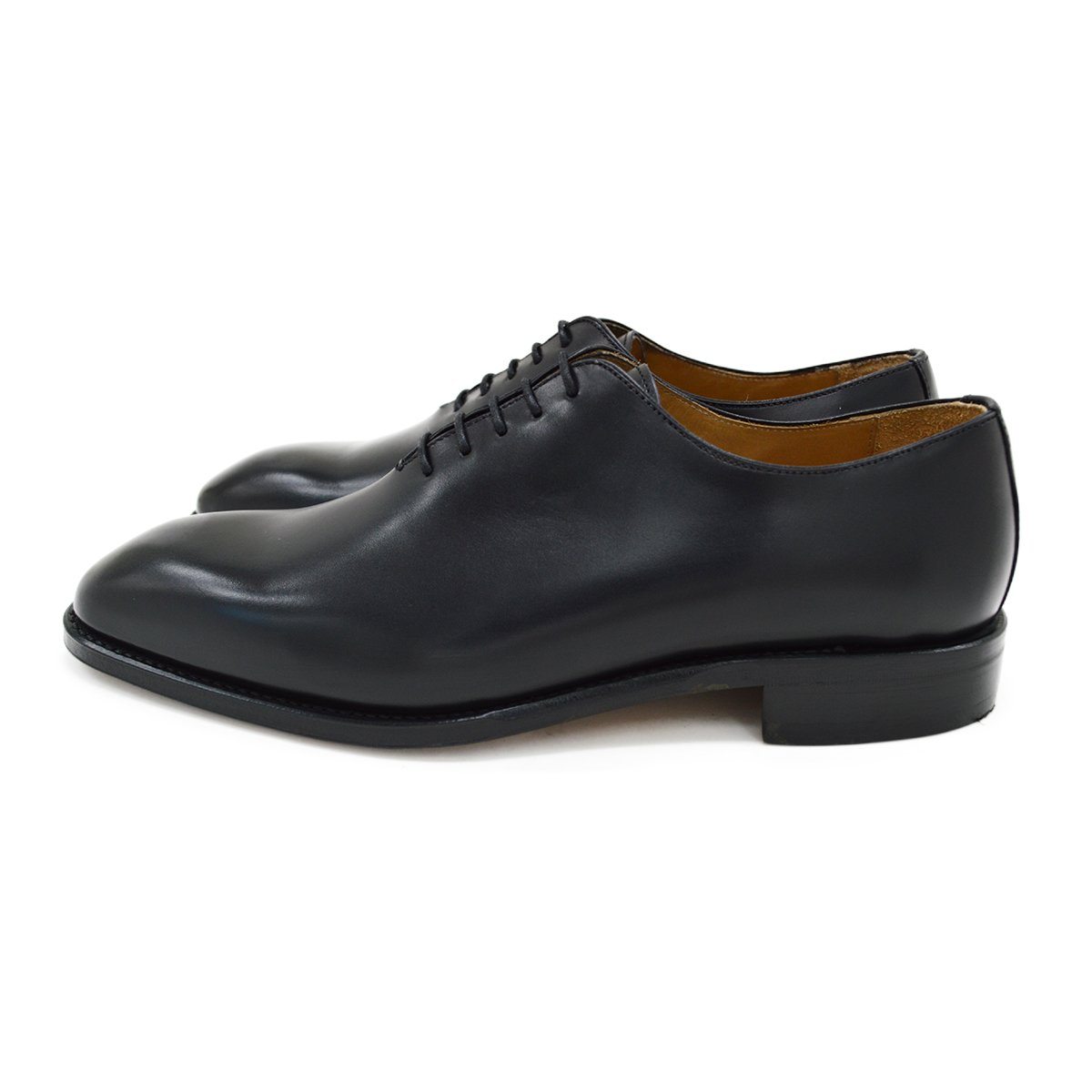 A Berwick 1707 black leather Oxford shoe with a wholecut design and lace-up closure, side view.