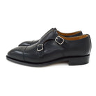 A Berwick 1707 lack double monk shoe with two buckle straps, made from calf leather and featuring a Goodyear welted leather sole.