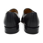 A Berwick 1707 lack double monk shoe with two buckle straps, made from calf leather and featuring a Goodyear welted leather sole.