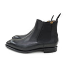 A Berwick 1707 black leather Chelsea boot with a side elastic panel and a low heel, displayed on a white background.