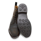 A Berwick 1707 dark brown, waxed roughout suede classic country toe cap derby boot with Dainite rubber sole and lace-up closure.