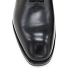 A Berwick 1707 black leather Oxford shoe with a wholecut design and lace-up closure