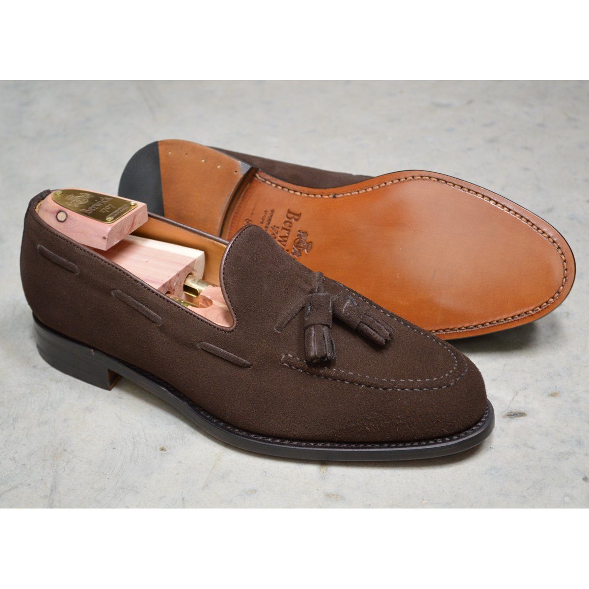 A classic dark brown suede slip-on shoe with tassels, by Berwick 1707.