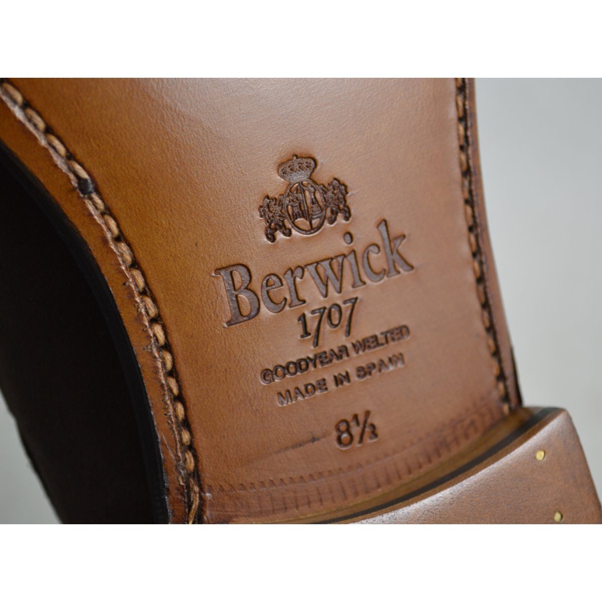 A classic dark brown suede slip-on shoe with tassels, by Berwick 1707.