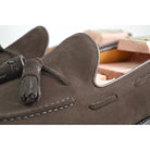 A classic dark brown suede slip-on shoe with tassels, by Berwick 1707.