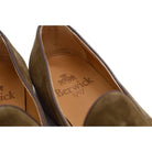 A brown suede tassel Berwick 1707 Belgian loafer with a combination leather and fine rubber sole.