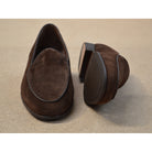Brown Berwick 1707 Belgian suede loafer shoe on a brown background