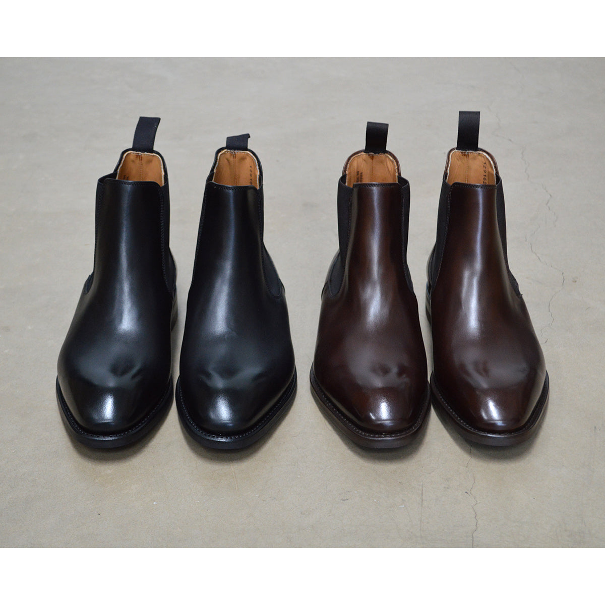 A Berwick 1707 black leather Chelsea boot with a side elastic panel and a low heel