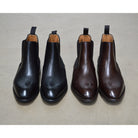 A Berwick 1707 black leather Chelsea boot with a side elastic panel and a low heel