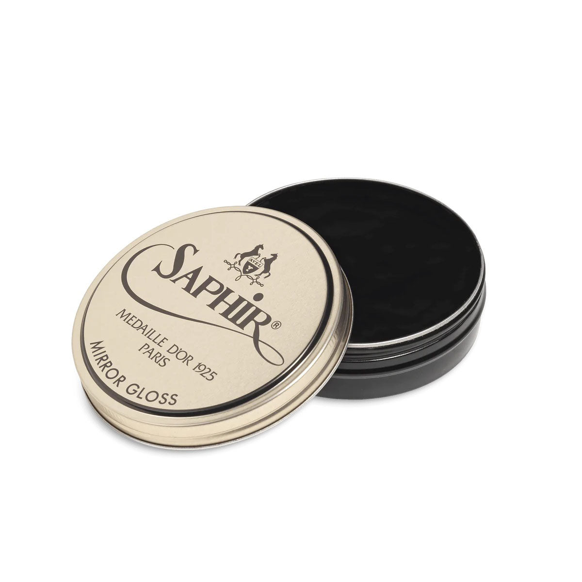 A tin of Saphir Medaille D'Or Mirror Gloss Wax Polish with the brand's logo and product name displayed on the lid.