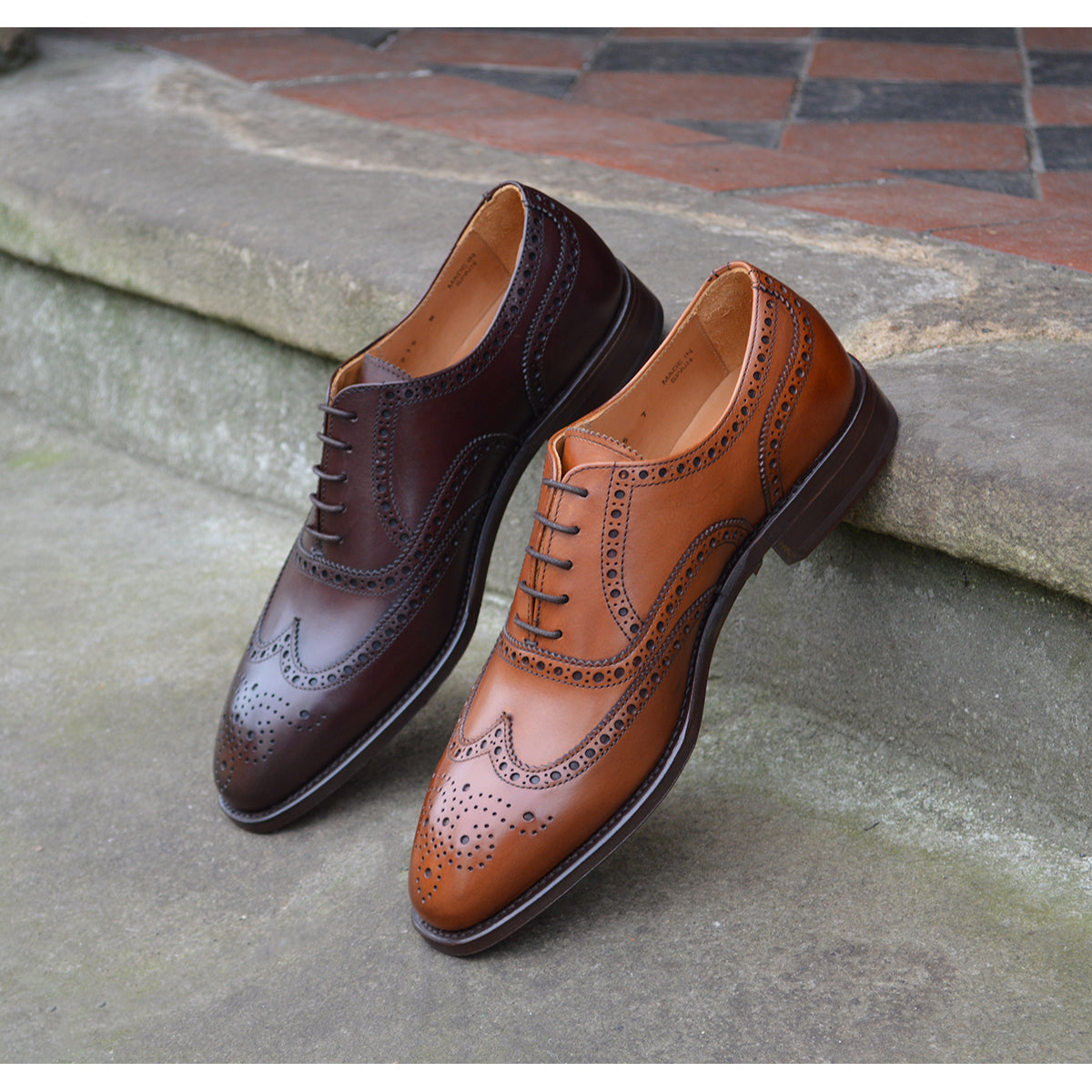 A tan Berwick 1707 Oxford Brogue shoe with intricate brogue detailing and a goodyear welted leather sole.