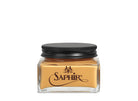 A glass jar with a black lid labeled 'SAPHIR' containing cream shoe polish.