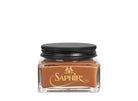 A glass jar with a black lid labeled 'SAPHIR' containing cream shoe polish.