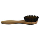 A hand crafted suede brush with a boar bristle head and an oxhorn back attached to a beechwood handle.