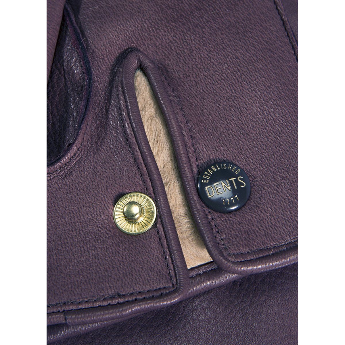 A pair of bark deerskin leather gloves with rabbit fur lining, featuring three points and Dents stud closure.